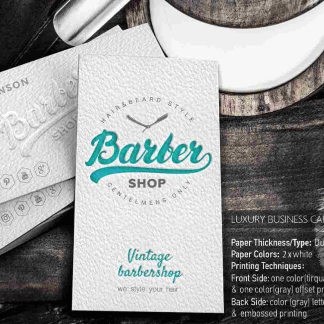 White business card with leterpress printing.